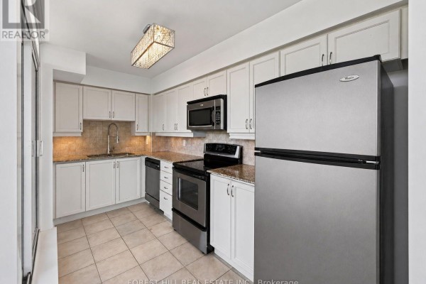 Primary Bedroom - Ph310 - 18 Valley Woods Road, Toronto, ON M3A0A1 Photo 4