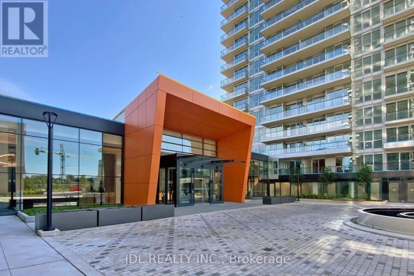 Entrance to the building with modern architecture and landscaped courtyard. - Ph4101 - 95 Mcmahon Drive, Toronto