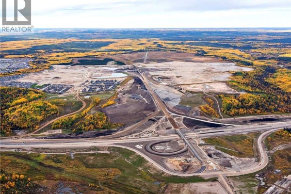 Aerial view of roadways and development areas in Fort McMurray with fall foliage. - Plan 1422879 Block 19 Lot 1, Fort Mcmurray