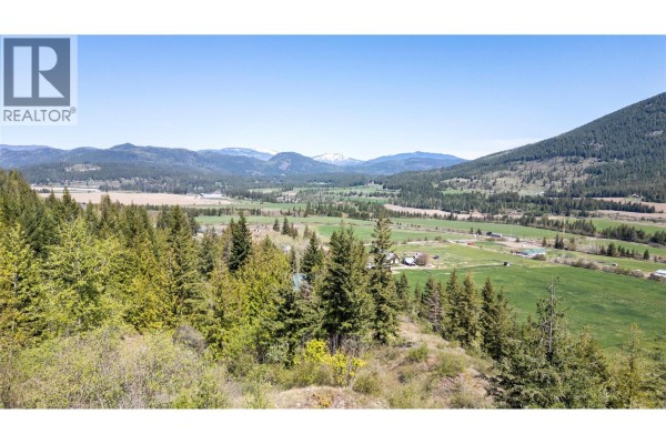 Overhead view of rolling green fields and scattered buildings nestled amongst trees. - Planned Lot 1 Tappen Notch Hill Road, Tappen