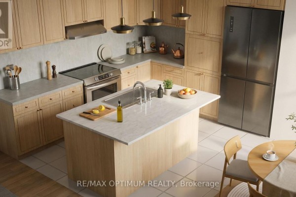 Kitchen with light wood cabinets, marble countertops, and stainless steel appliances. - Potl Lot 17 Walden Boulevard, Fort Erie