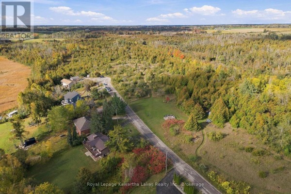 Aerial view of a wide lake with marshy shores and surrounding wooded countryside. - Pt Lt 17 Southside Road, Kawartha Lakes