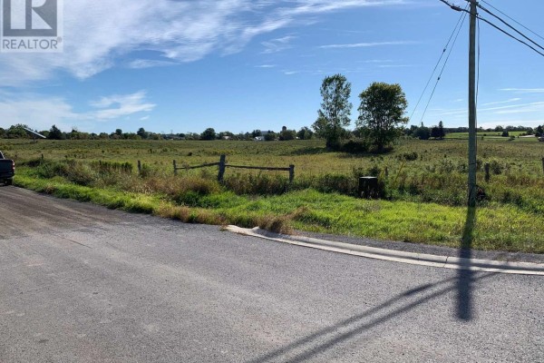 Distant aerial view of the land parcel, highlighting its location within a larger rural landscape. - Pt Lt 19 Con 4 County Rd 8, Greater Napanee