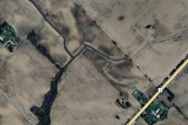 Aerial view of agricultural land with nearby residential properties and roadways - Pt Lt26 Longwoods Road, Southwest Middlesex