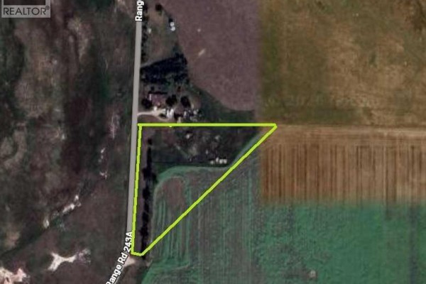 Overhead view of a triangular parcel of land with a road on the west side. - Range Road 244 Township Road 250, Rural Wheatland County