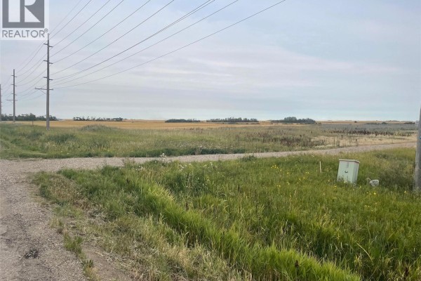 Wide shot of the area showing power lines and open fields adjacent to the property. - Rm Of Wallace Ochs Land, Wallace Rm No  243