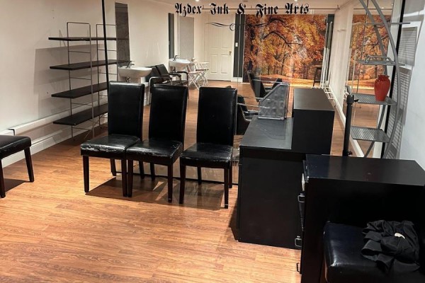 Spacious area with black chairs and shelving, suitable for styling or treatments - Unit 10 - 10610 Bayview Avenue, Richmond Hill