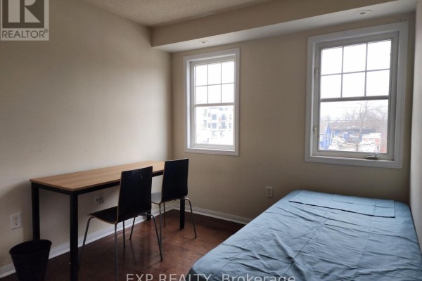Living room - Unit 2 - 8822 Sheppard Avenue E, Toronto, ON M1B6J4 Photo 3