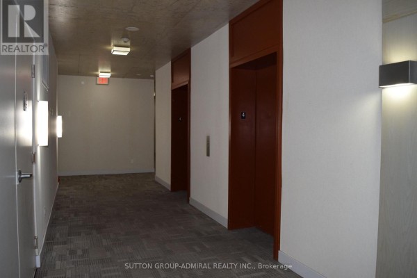 Living room - Unit# 411 - 2055 Danforth Avenue, Toronto, ON M4C1J8 Photo 5