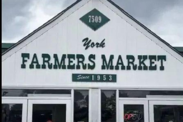 Close-up of York Farmers Market sign with establishment year - Unit A - 7509 Yonge Street, Markham