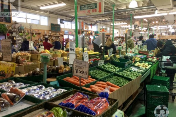 Aisles filled with fresh produce and customers shopping - Unit A - 7509 Yonge Street, Markham