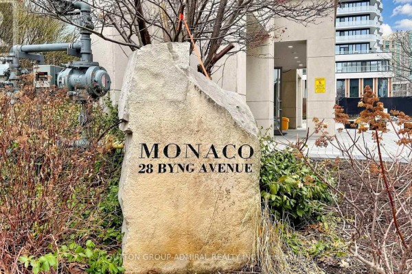 A large, rough-cut stone with the building name MONACO and address 28 BYNG AVENUE inscribed. - Uph09 - 28 Byng Avenue, Toronto