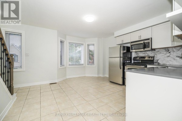 Kitchen - Upper - 125 Viella Street, Toronto, ON M6N5C7 Photo 3