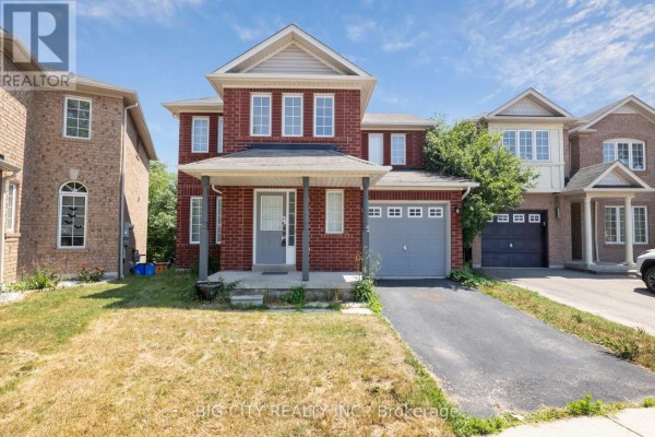 Front exterior view of a red brick house with a driveway and attached garage. - Upper - 23 Angier Crescent, Ajax