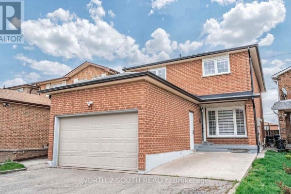 Exterior of a brick house with a double-car garage. - Upper - 37 Loire Court, Toronto