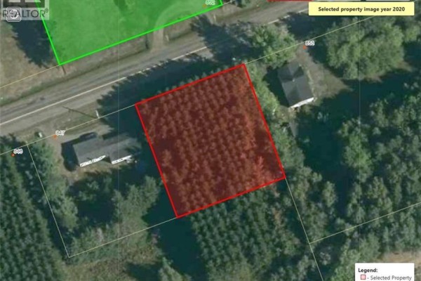 Aerial view of a red-outlined rectangular lot with dense trees, surrounded by other properties and roads. - Vacant Lot 74-1a Cape Breton Rd Road, Irishtown