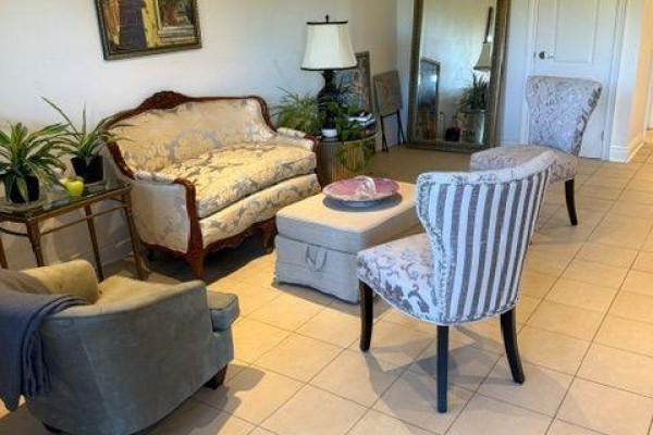 Living room with ornate gold and white sofa, two patterned chairs, and an ottoman with chairs. - W/o Basement - 21 Bristlewood Crescent, Vaughan